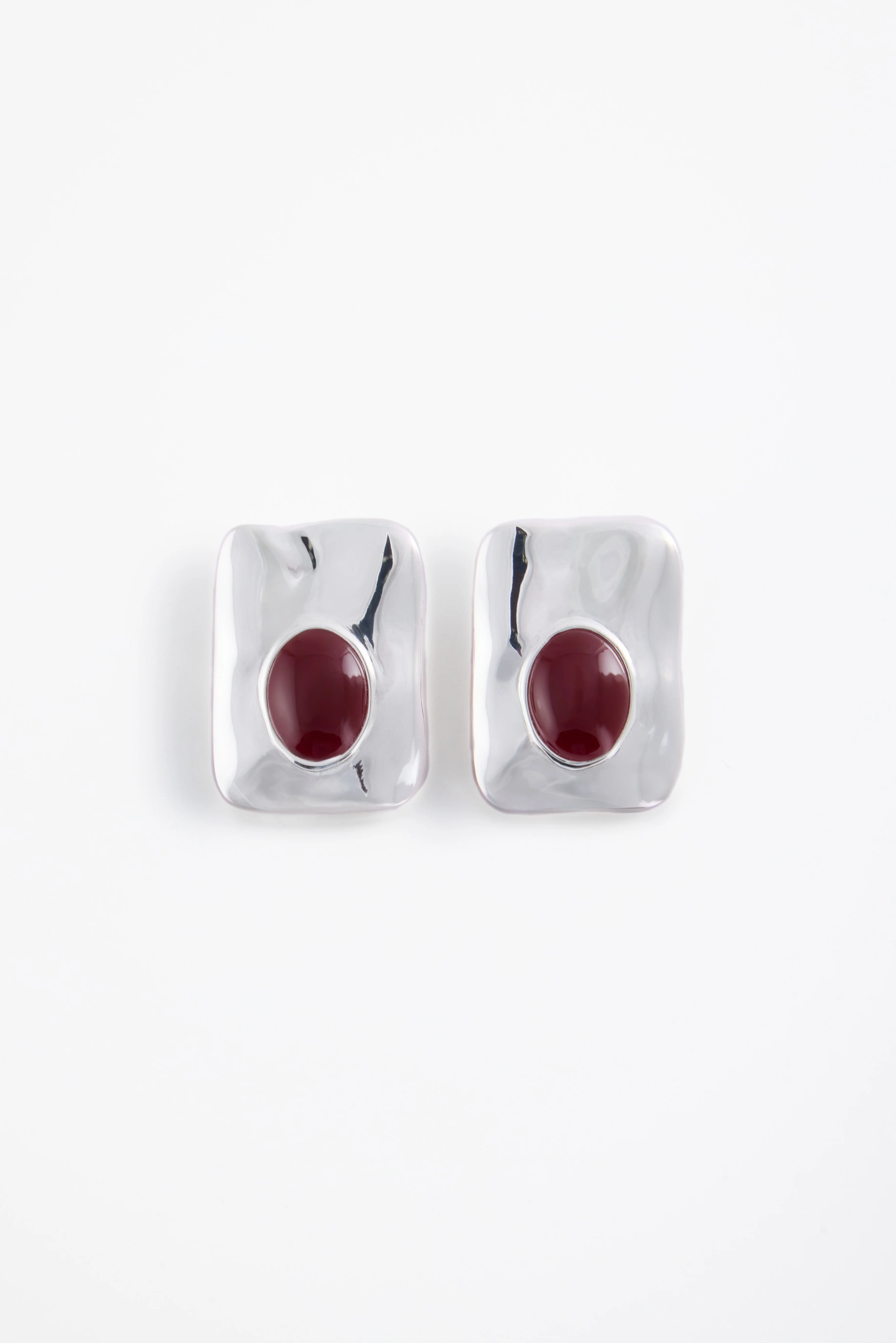 1145-hammered-stone-earring-silver-oxblood-1.webp Hammered Stone Earring (Silver/Oxblood)